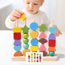 A wooden Montessori set featuring 5 vertical columns for stacking geometric blocks like stars and hearts, plus a red threading lace with beads and a stack of pattern activity cards.