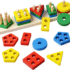 Educational wooden shape sorter board and colorful wooden lacing clock for Montessori-style learning